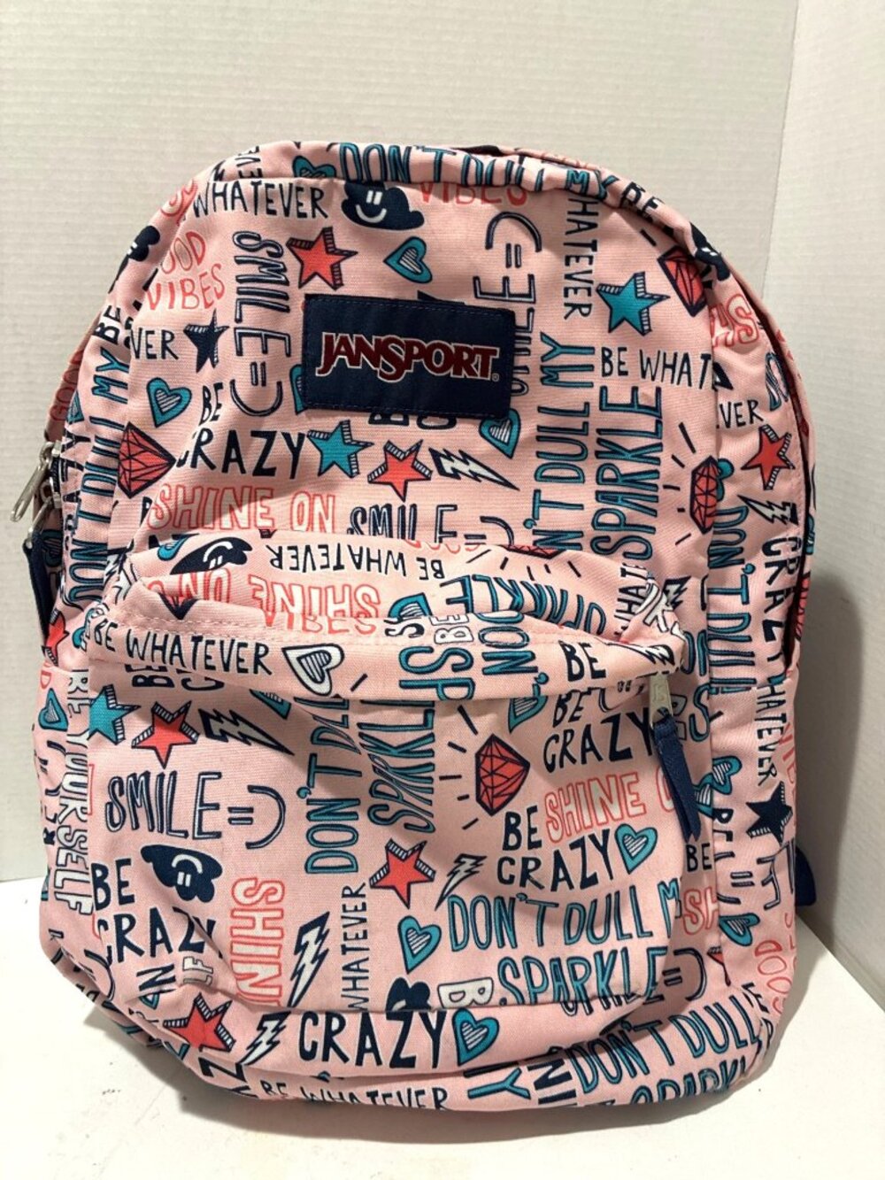 JanSport SuperBreak backpack graphic print motivational text & symbols color pin